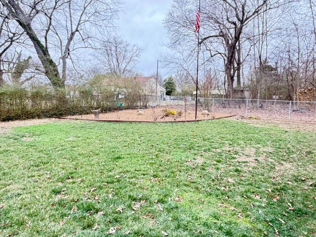 112 Ragan Street Tullahoma, TN 37388 - Photo 19 of 23 a view of a garden with trees