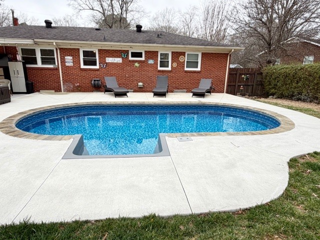 112 Ragan Street Tullahoma, TN 37388 - Photo 2 of 23 a view of a house with backyard and sitting area