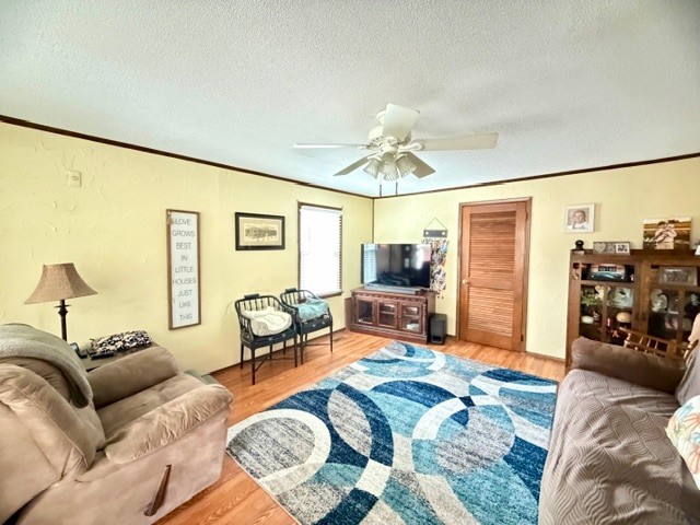 112 Ragan Street Tullahoma, TN 37388 - Photo 9 of 23 a living room with furniture and a flat screen tv