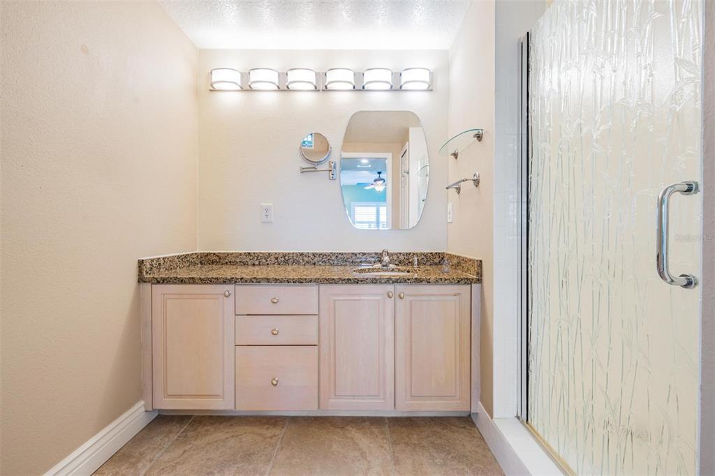 399 150th Avenue, Unit 315 Madeira Beach, FL 33708 - Photo 23 of 53 a view of front door with hallway