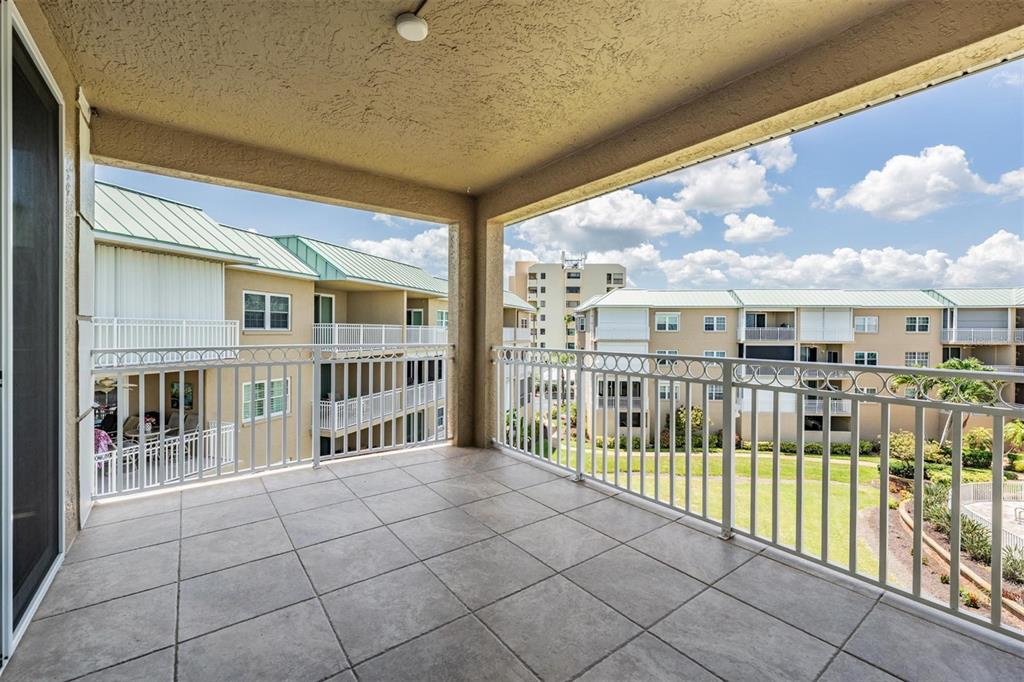 399 150th Avenue, Unit 315 Madeira Beach, FL 33708 - Photo 27 of 53 a view of a balcony