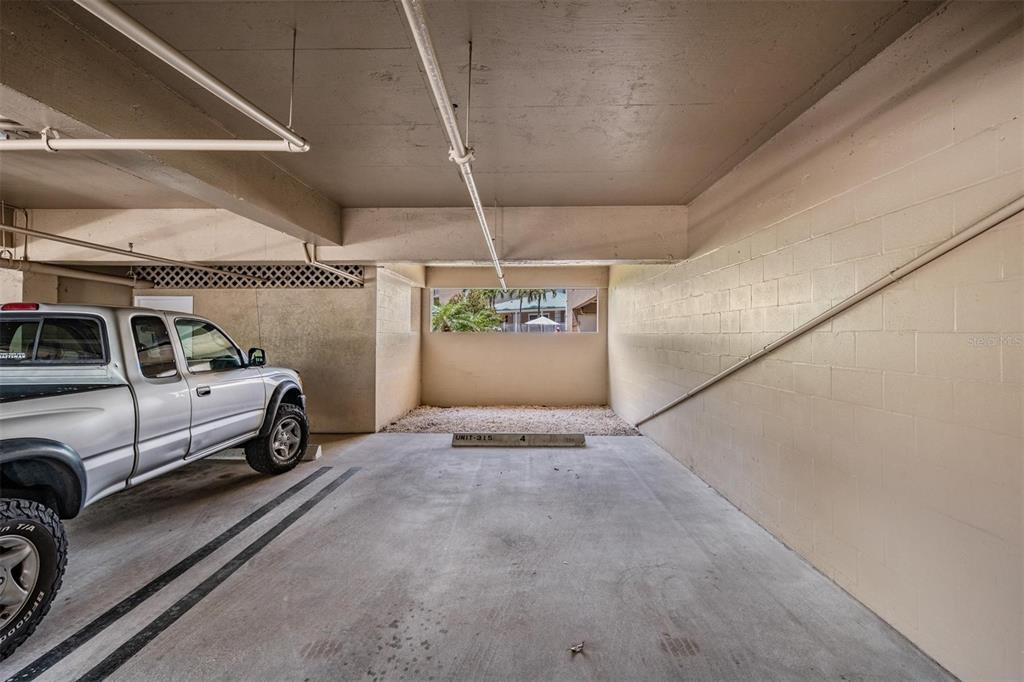 399 150th Avenue, Unit 315 Madeira Beach, FL 33708 - Photo 31 of 53 a view of a garage