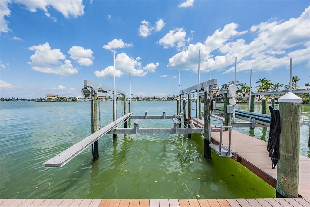 399 150th Avenue, Unit 315 Madeira Beach, FL 33708 - Photo 35 of 53 a view of a city with lots of trees