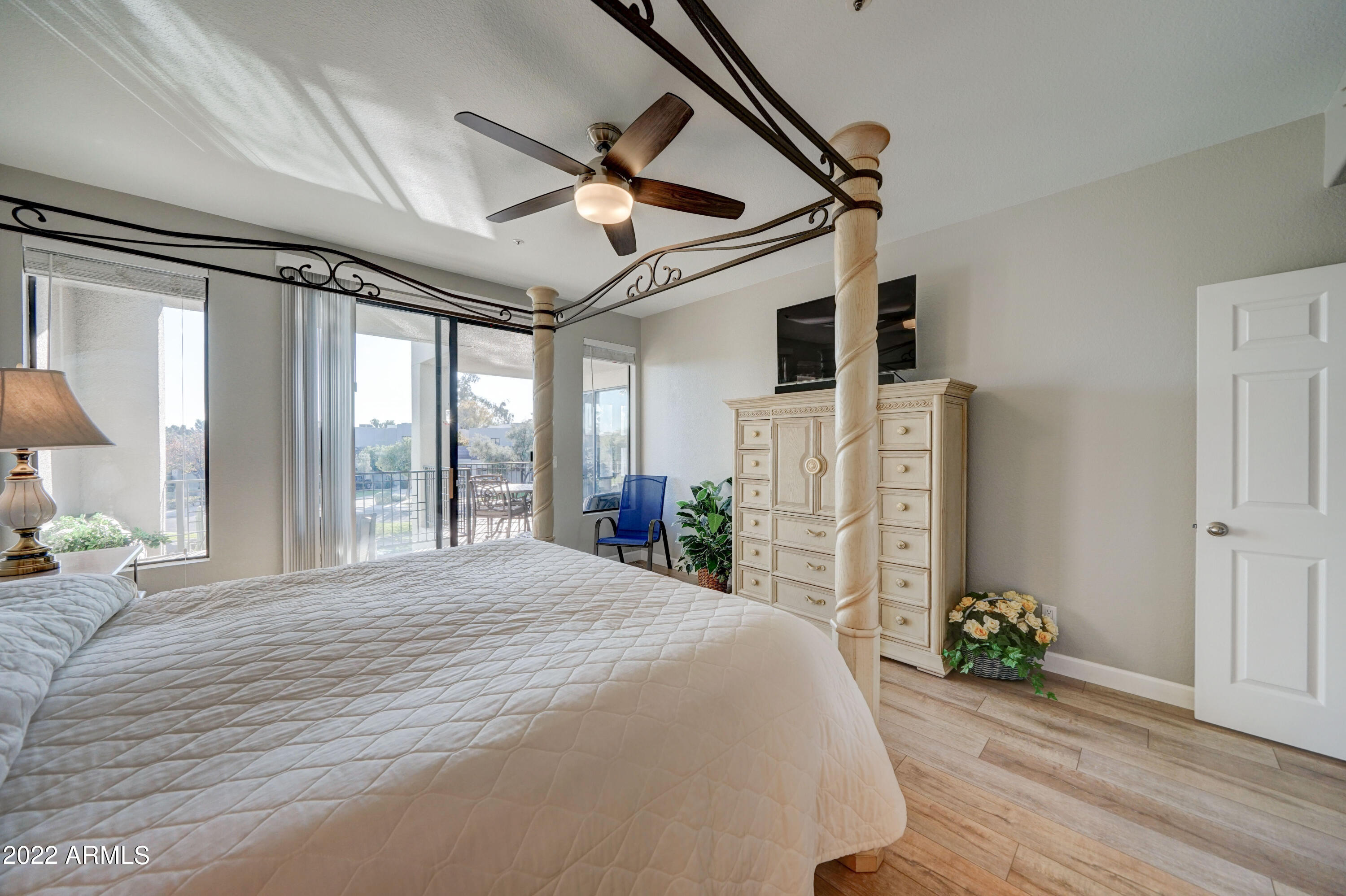 7700 East Gainey Ranch Road, Unit 223 Scottsdale, AZ 85258 - Photo 19 of 45 Primary bedroom w/ balcony access