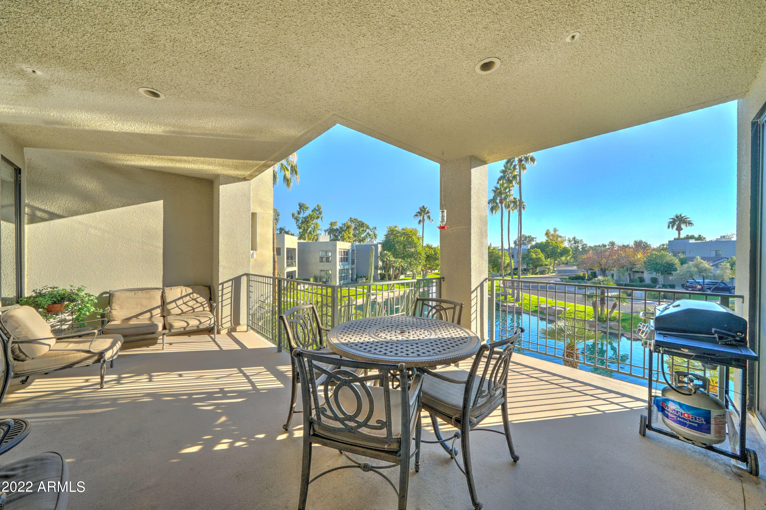 7700 East Gainey Ranch Road, Unit 223 Scottsdale, AZ 85258 - Photo 6 of 45 Oversized balcony!!! Lagoon view!