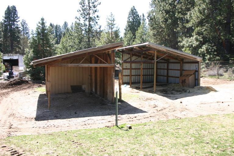 19129 Pumice Butte Road Bend, OR 97702 - Photo 17 of 18 a view of a house with a yard covered in snow
