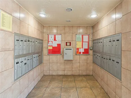 a bathroom with glass door shower