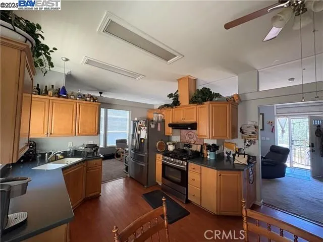 a kitchen with granite countertop lots of counter top space