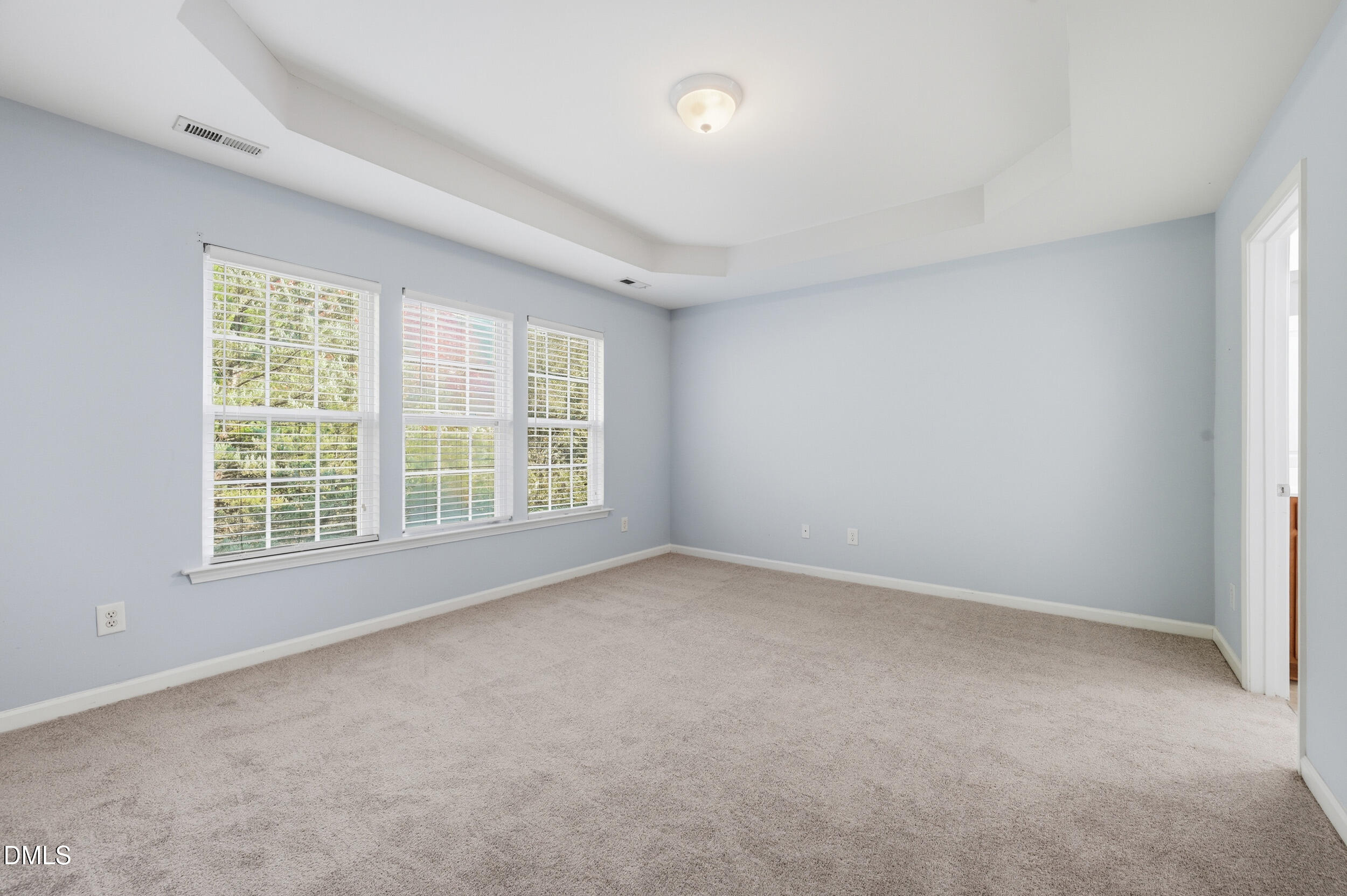 8412 Pilots View Drive Raleigh, NC 27617 - Photo 18 of 40 an empty room with a window