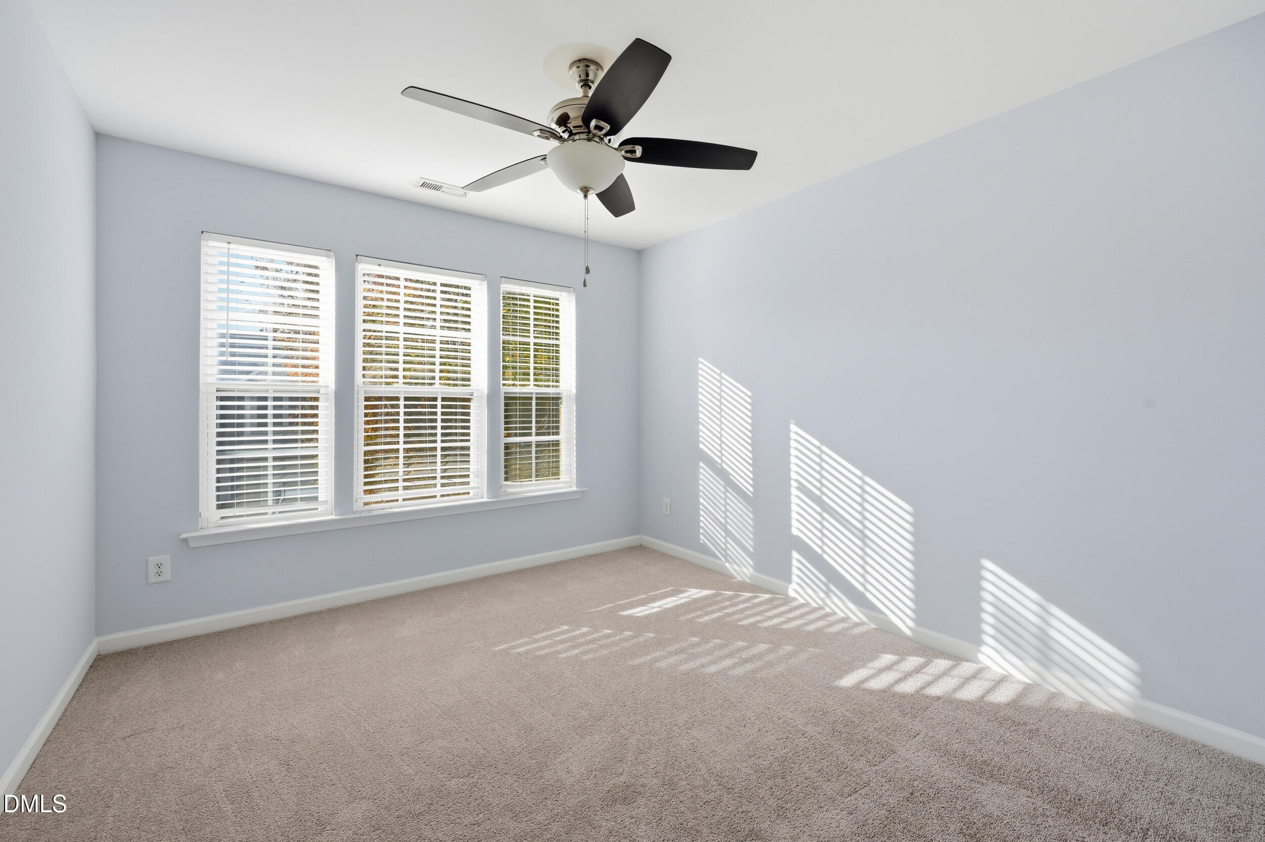 8412 Pilots View Drive Raleigh, NC 27617 - Photo 24 of 40 a view of an empty room with a window