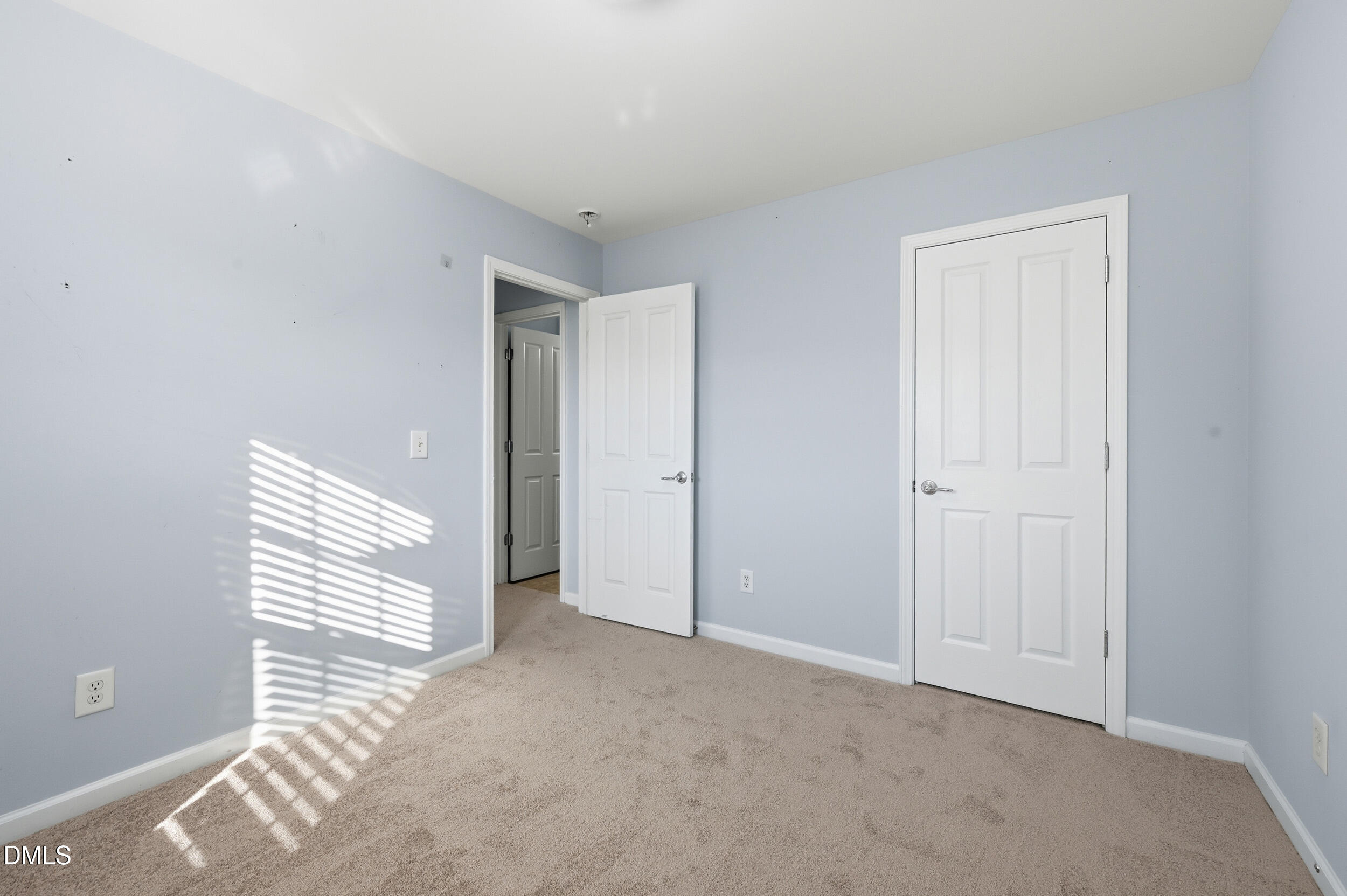 8412 Pilots View Drive Raleigh, NC 27617 - Photo 27 of 40 a view of a livingroom with an empty space and a window