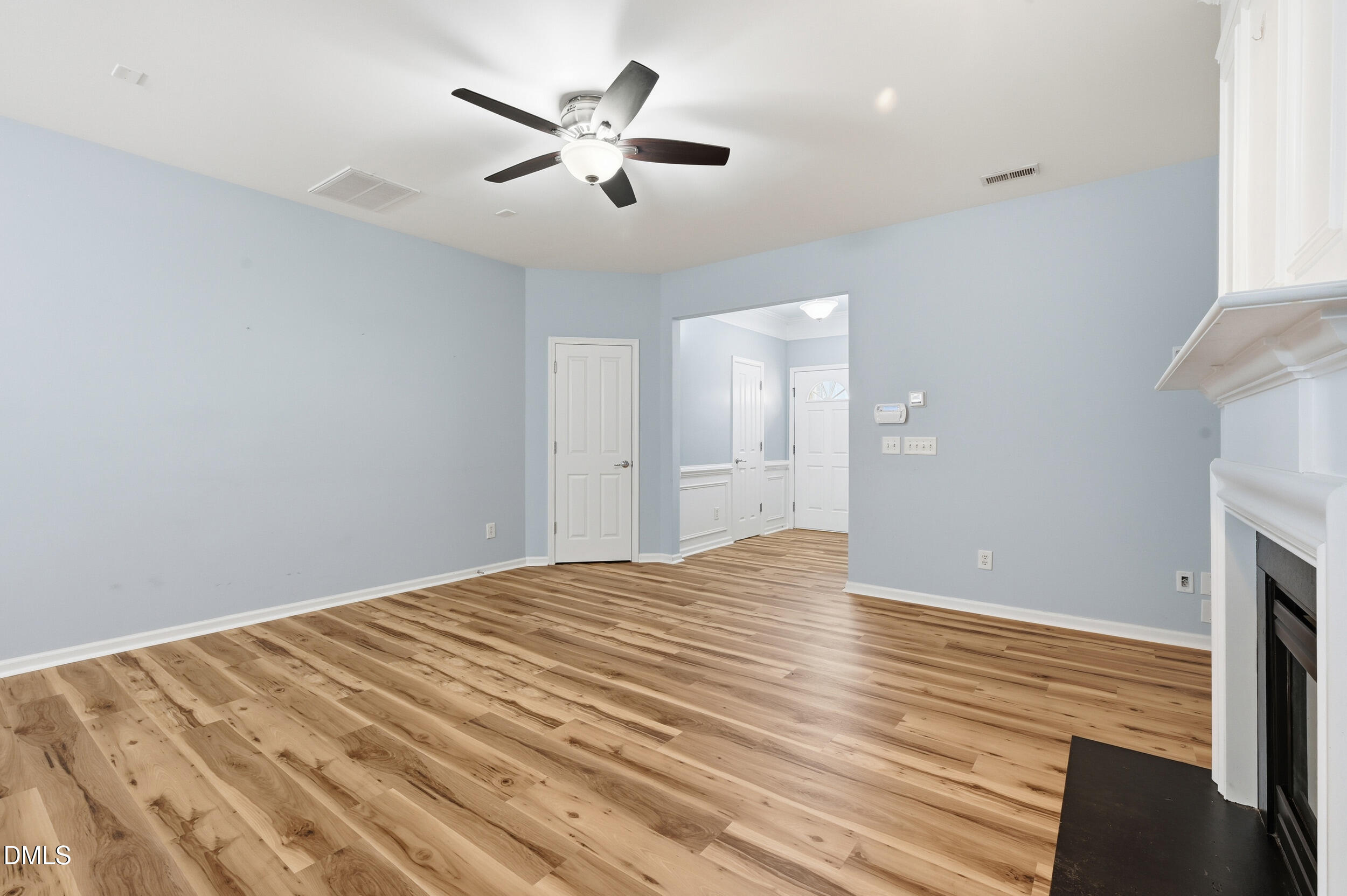 8412 Pilots View Drive Raleigh, NC 27617 - Photo 9 of 40 a view of empty room with wooden floor