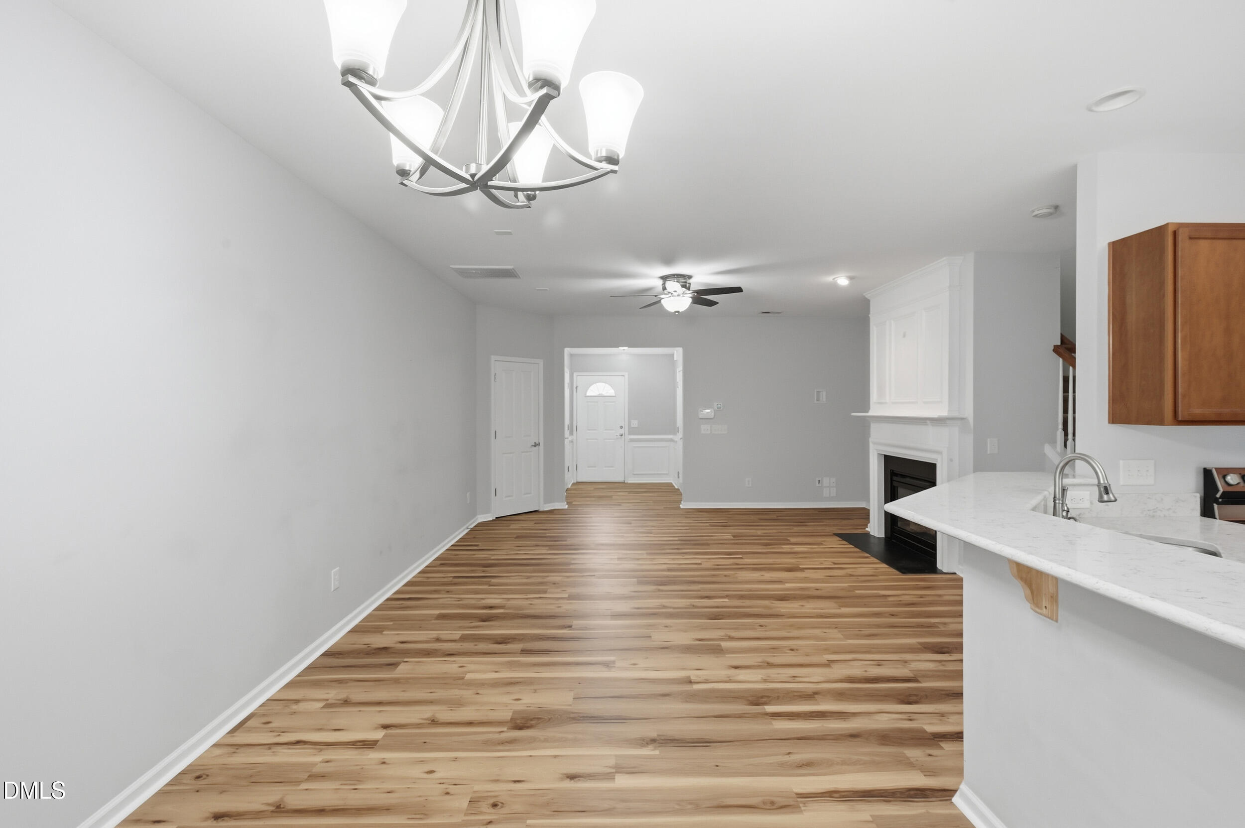 8412 Pilots View Drive Raleigh, NC 27617 - Photo 10 of 40 a view of empty room with wooden floor and fan
