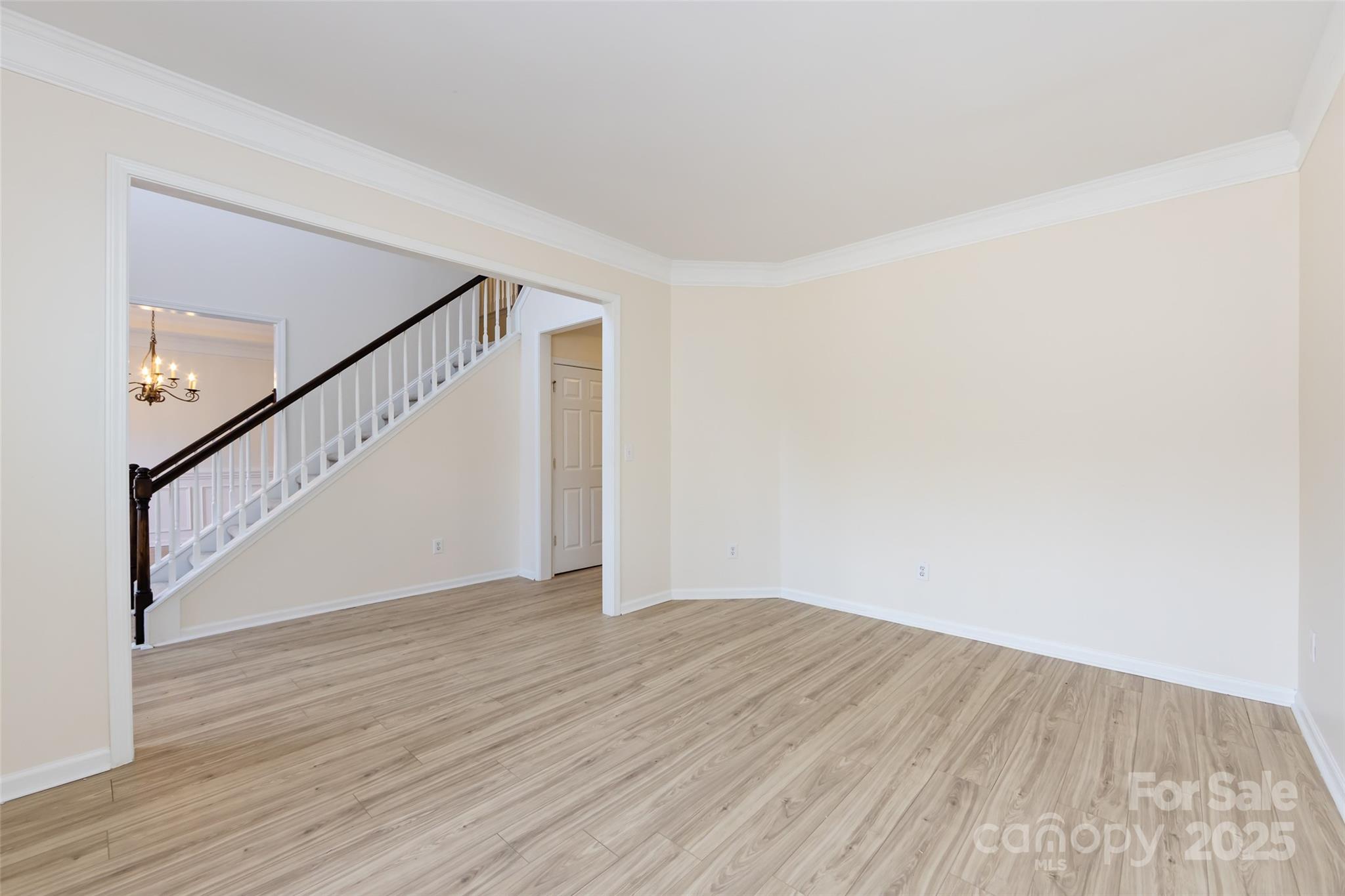 2705 Gosling Terrace Road Charlotte, NC 28262 - Photo 11 of 25 a view of an empty room with wooden floor