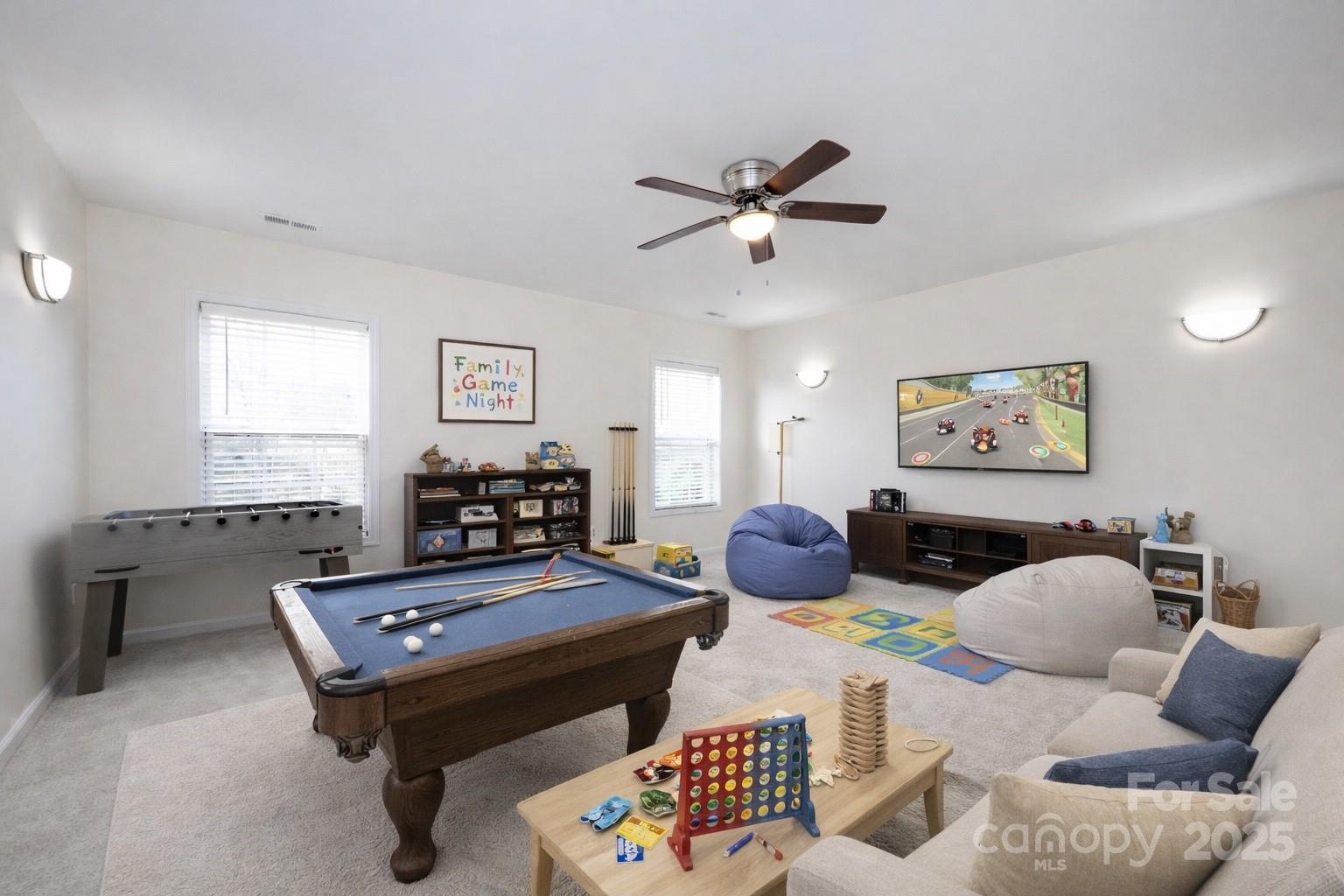 2705 Gosling Terrace Road Charlotte, NC 28262 - Photo 16 of 25 a living room with furniture a rug and a window