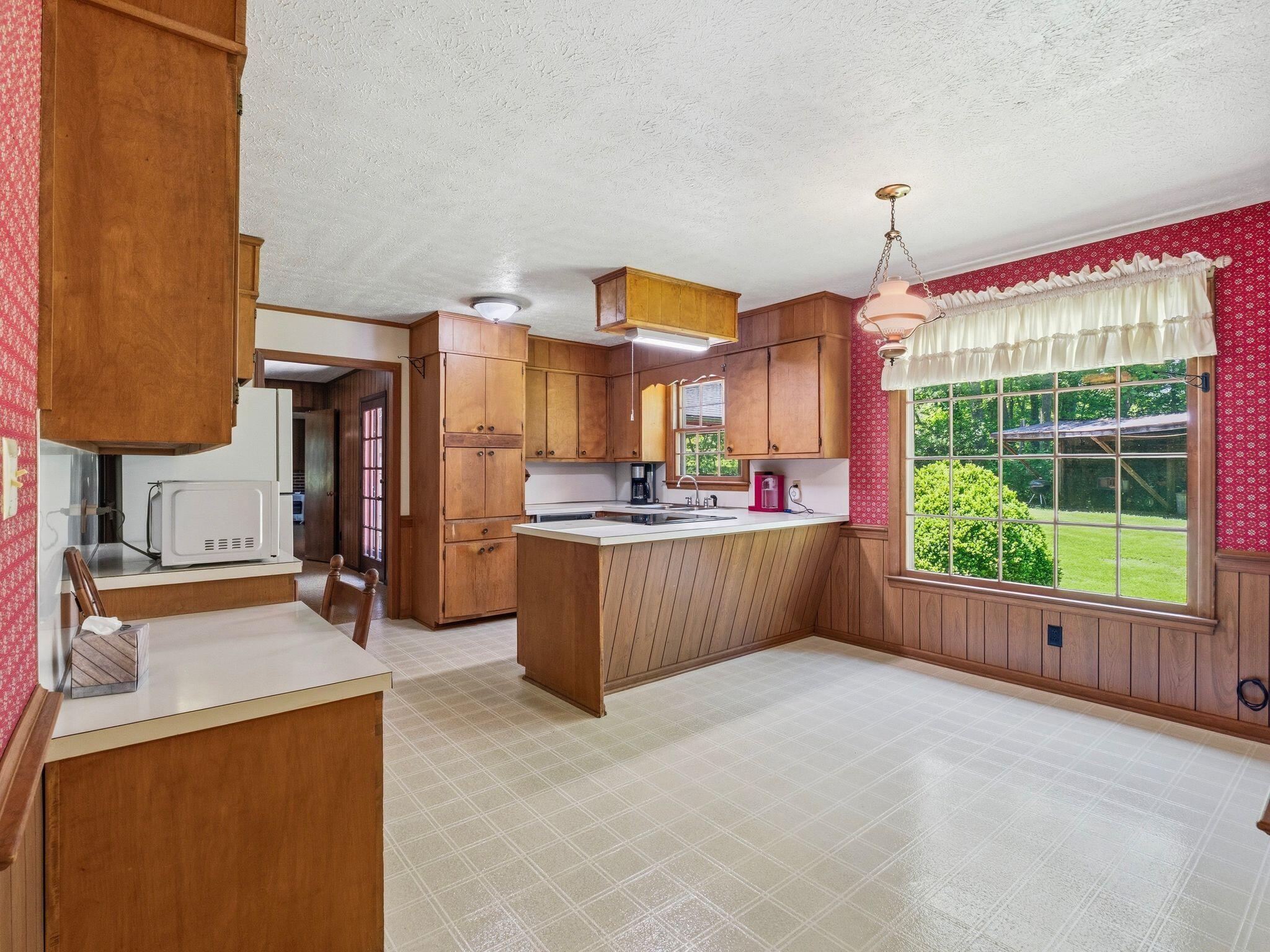 1115 Robin Ridge Road Henry, VA 24102 - Photo 7 of 54 a view of kitchen with furniture and a window