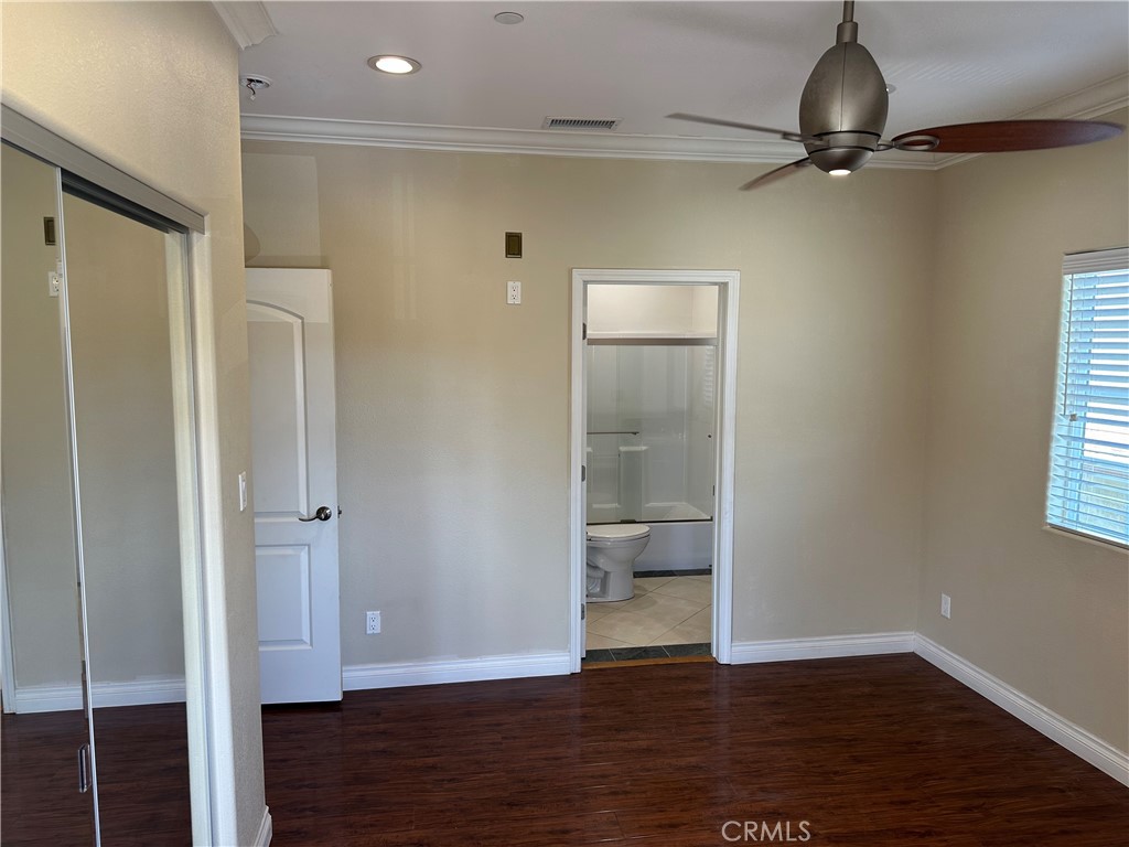 719 East Harvard Road Burbank, CA 91501 - Photo 12 of 23 a view of a room with wooden floor cabinet and windows