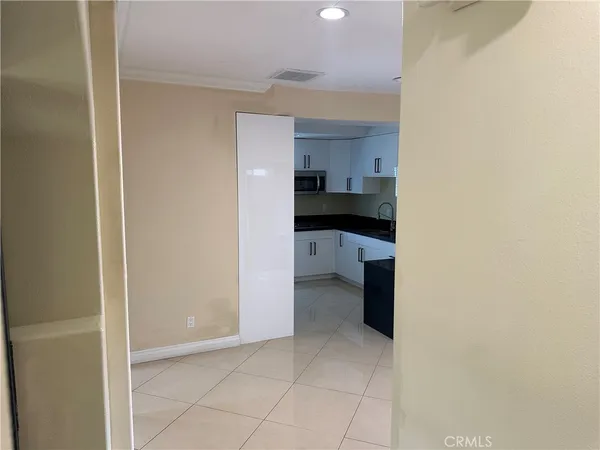 a view of a kitchen and a sink