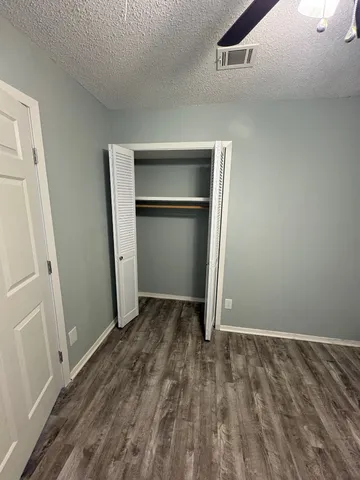 an empty room with closet