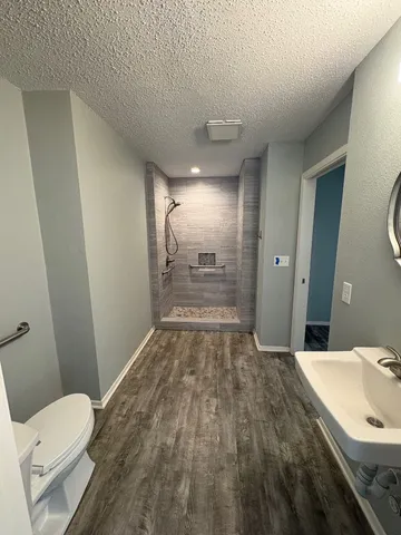 a bathroom with a sink and mirror