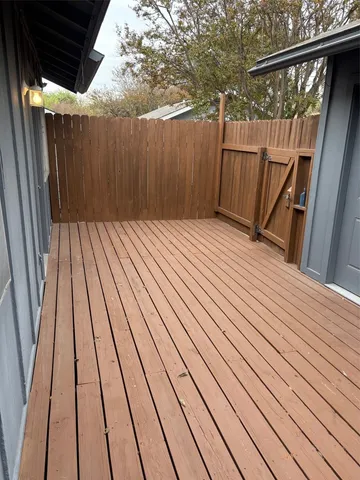 a view of outdoor space with wooden deck