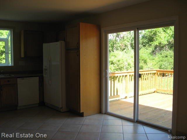 5670 Greer Road West Bloomfield, MI 48324 - Photo 5 of 12 Doorwall to deck