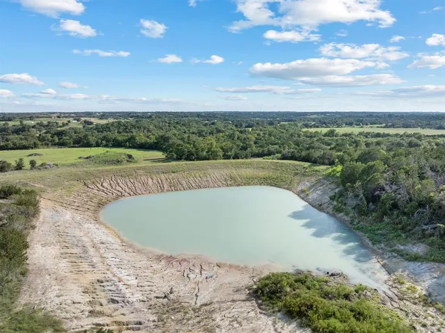 a view of a swimming pool and mountain
