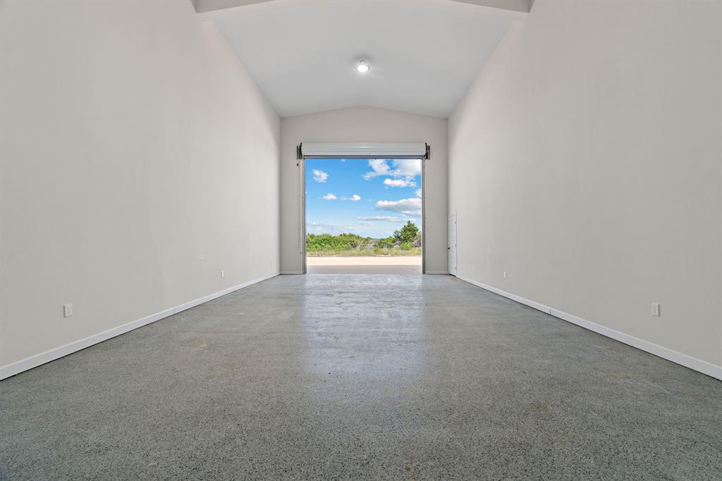5410 Buffalo Ridge Drive, Unit L Stephenville, TX 76401 - Photo 25 of 40 a view of an empty room with a window