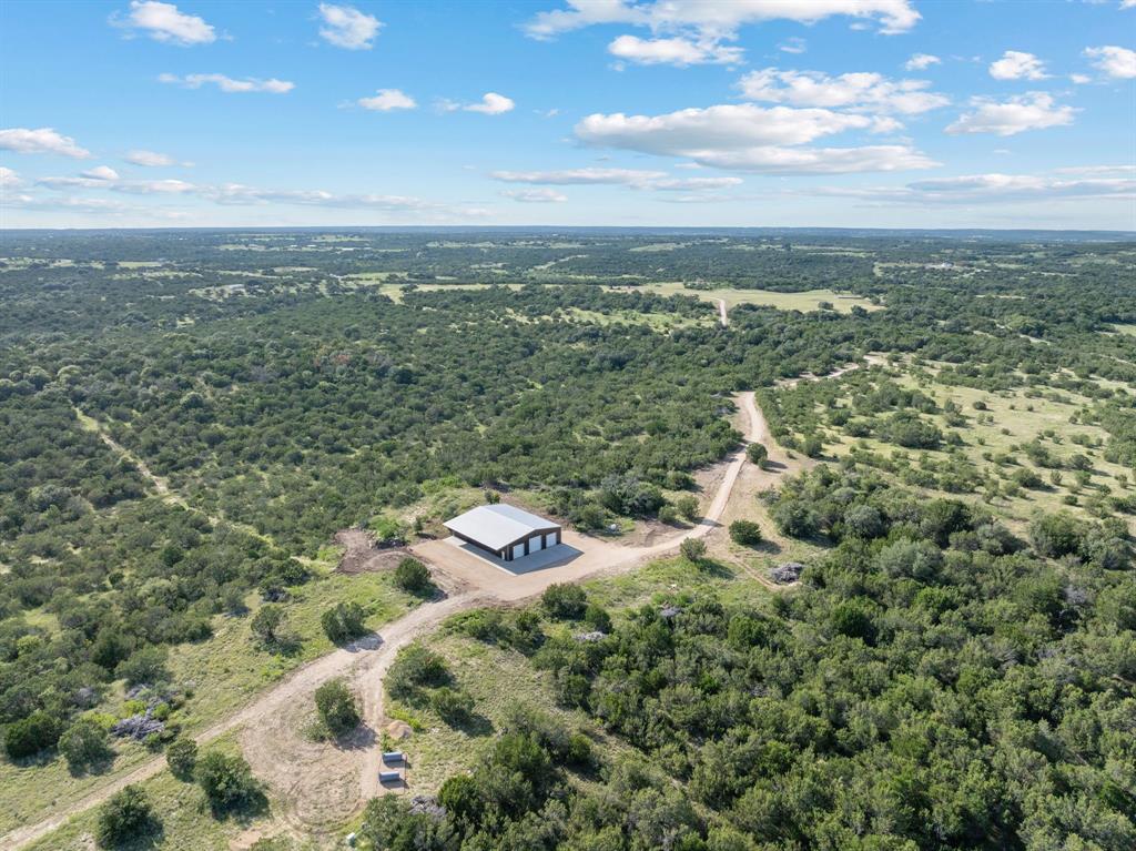 5410 Buffalo Ridge Drive, Unit L Stephenville, TX 76401 - Photo 32 of 40 an aerial view of residential houses with outdoor space