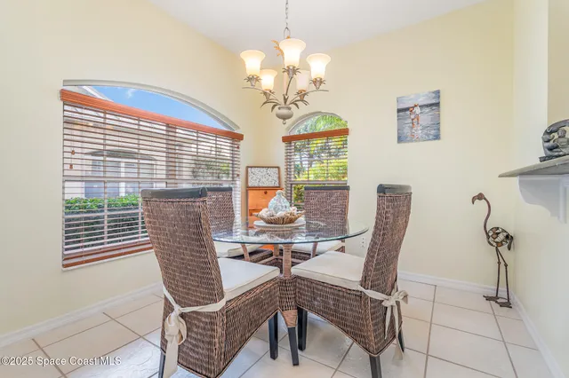 a room with furniture and white walls