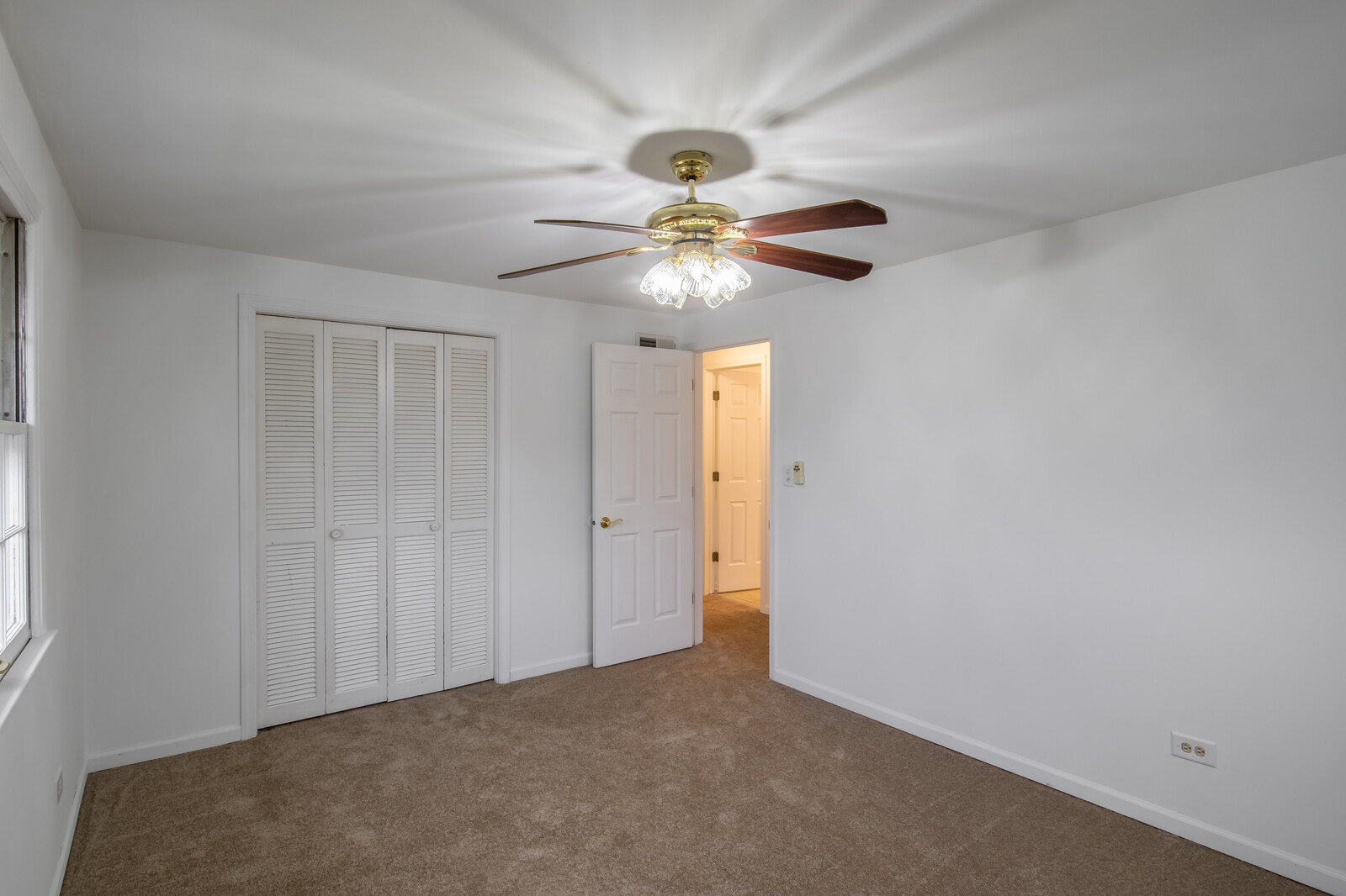 2321 Beck Road Lindenhurst, IL 60046 - Photo 16 of 30 a view of a chandelier fan in a room