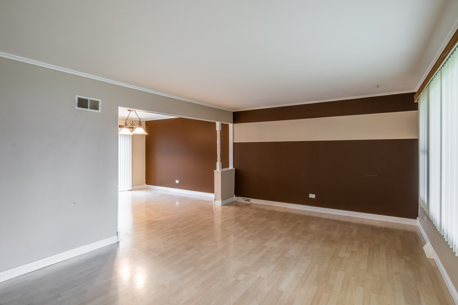 2321 Beck Road Lindenhurst, IL 60046 - Photo 2 of 30 a view of an empty room with wooden floor