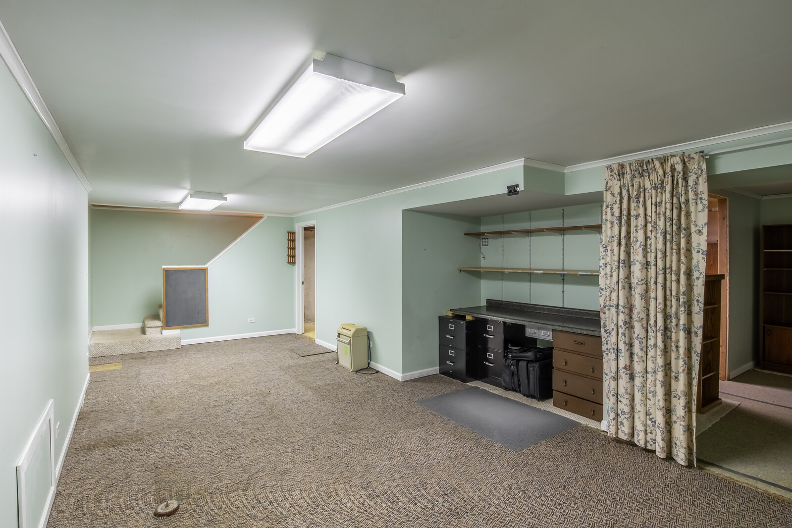 2321 Beck Road Lindenhurst, IL 60046 - Photo 23 of 30 a view of empty room with a fireplace and cabinet