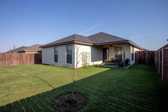 a house view with a garden space