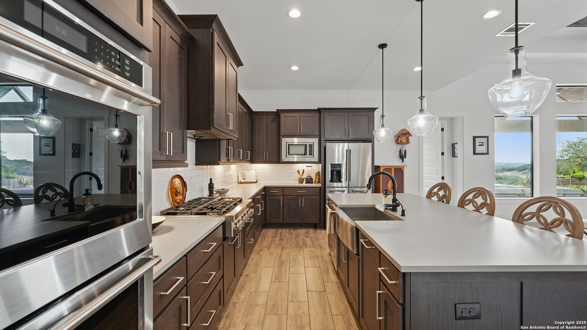 191 Crane Circle Spring Branch, TX 78070 - Photo 16 of 59 a kitchen with counter top space a sink and appliances