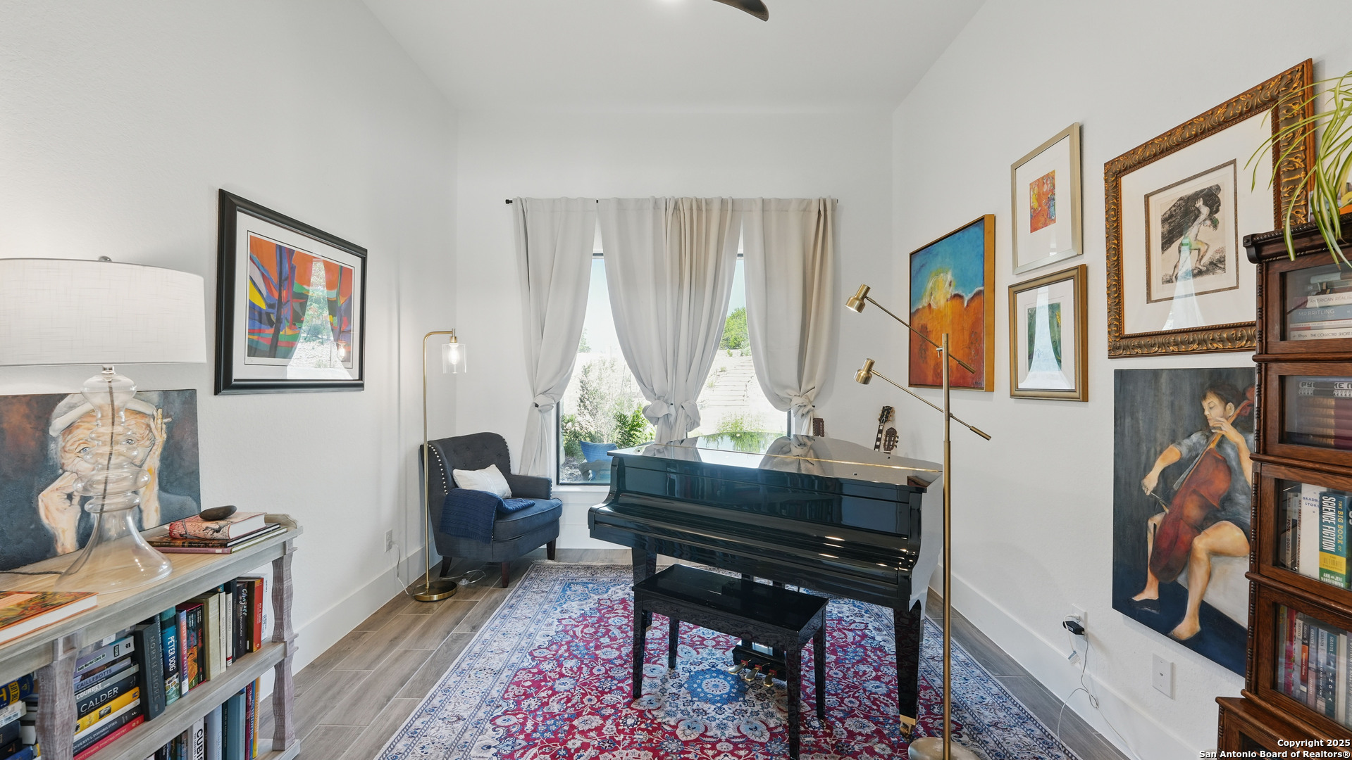 191 Crane Circle Spring Branch, TX 78070 - Photo 20 of 59 a living room with furniture piano and a window