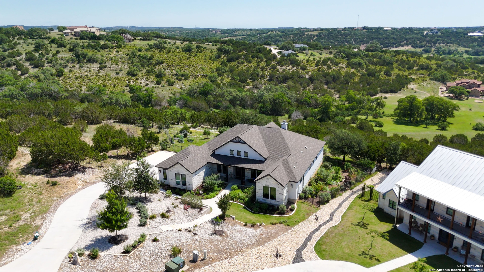 191 Crane Circle Spring Branch, TX 78070 - Photo 2 of 59 an aerial view of a house with garden space and street view