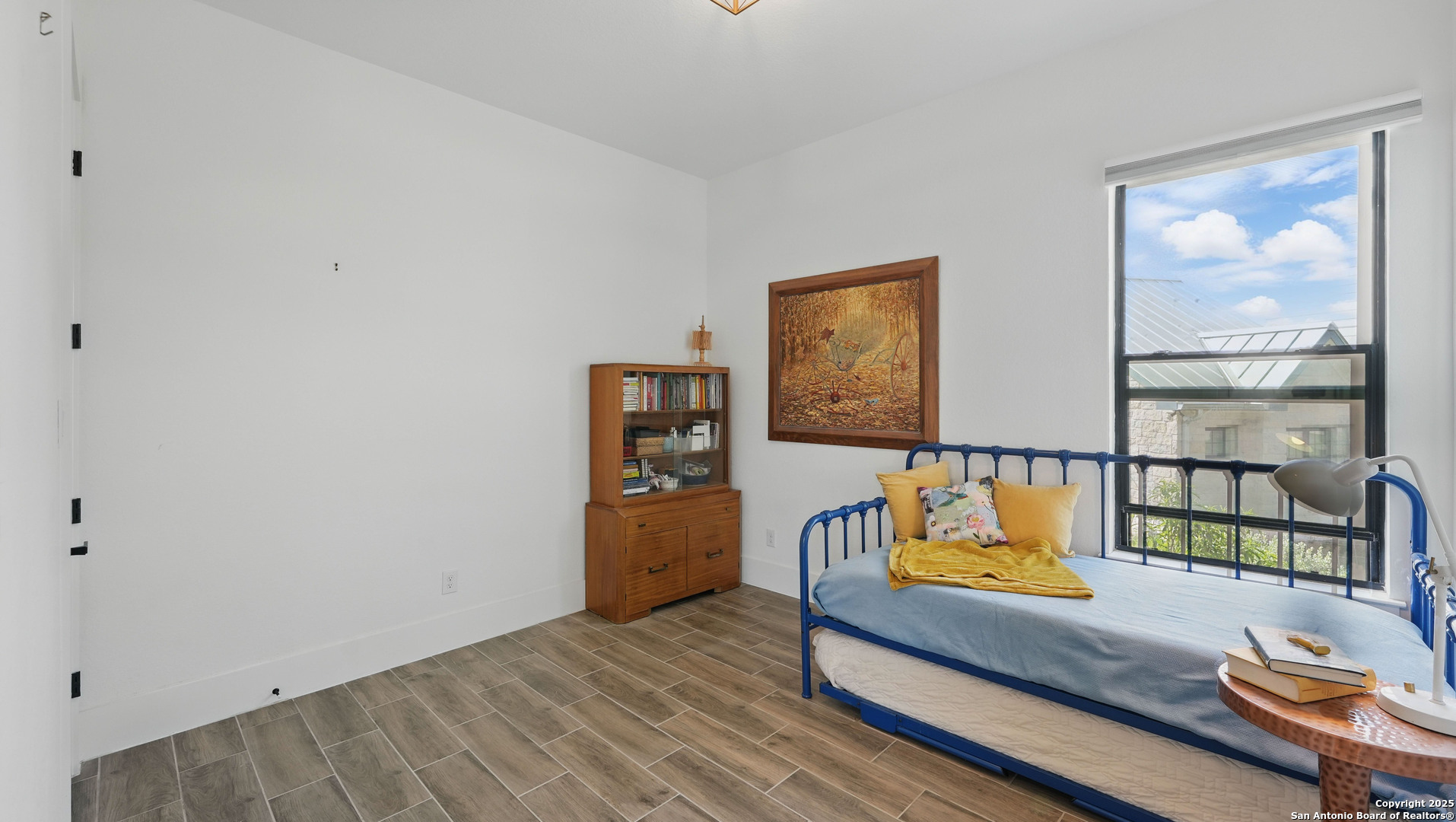 191 Crane Circle Spring Branch, TX 78070 - Photo 29 of 57 a bedroom with furniture and a window