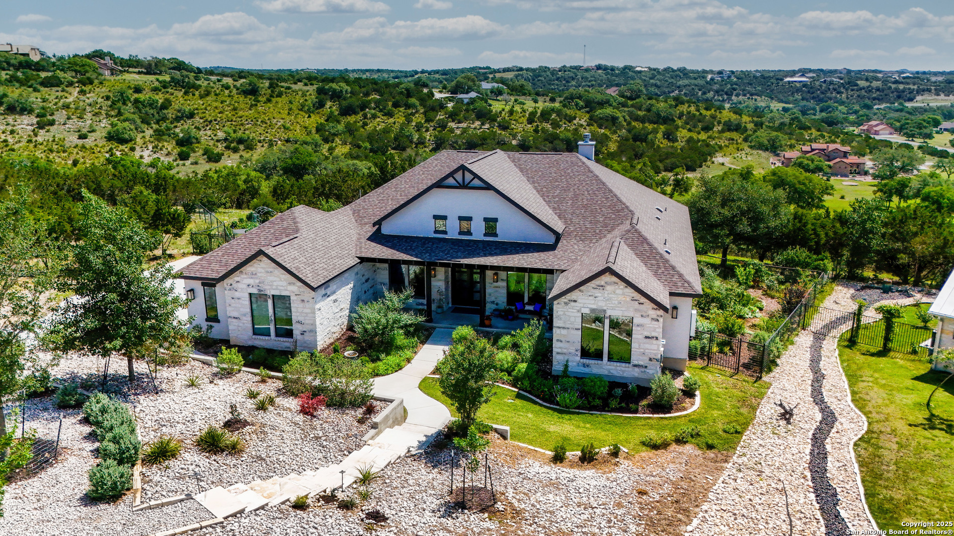 191 Crane Circle Spring Branch, TX 78070 - Photo 49 of 59 a aerial view of a house next to a yard