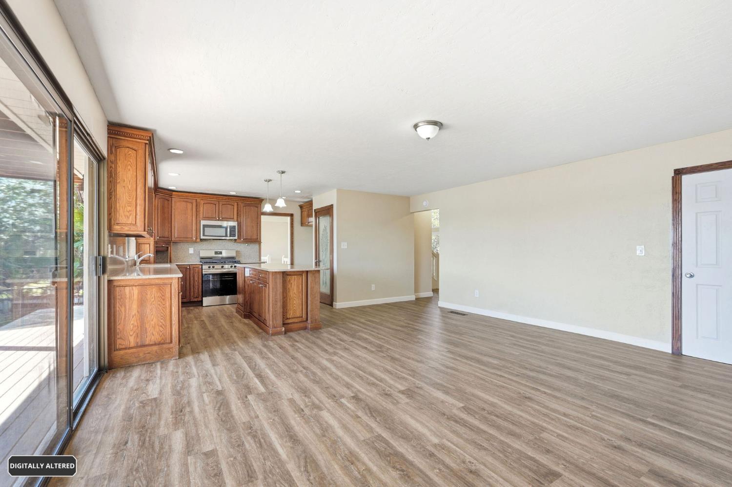 5501 Riverlake Road Discovery Bay, CA 94505 - Photo 22 of 60 a view of a kitchen with wooden floor
