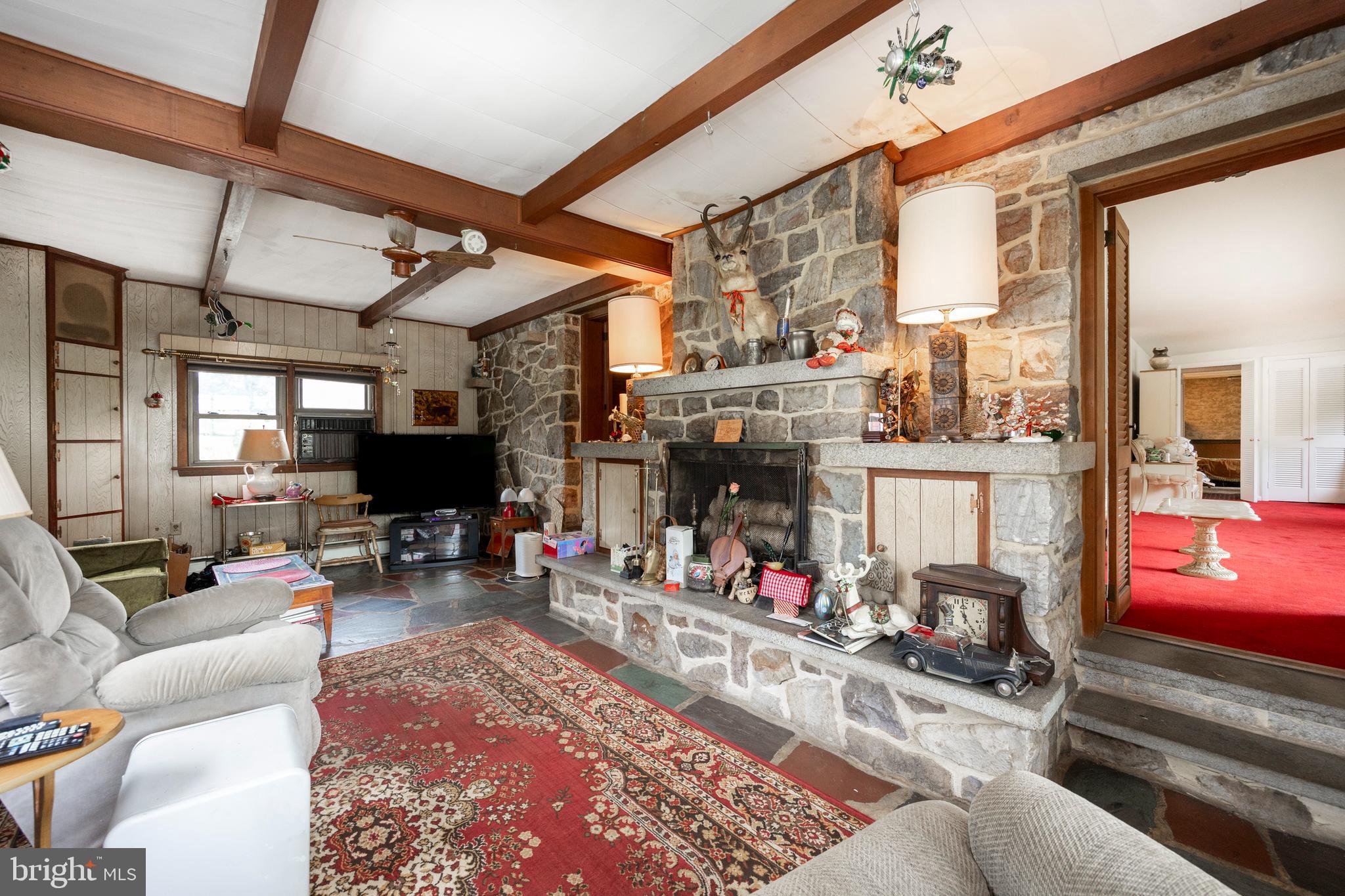 1071 Favinger Road Pottstown, PA 19465 - Photo 11 of 61 Slate den and stone fireplace in main home