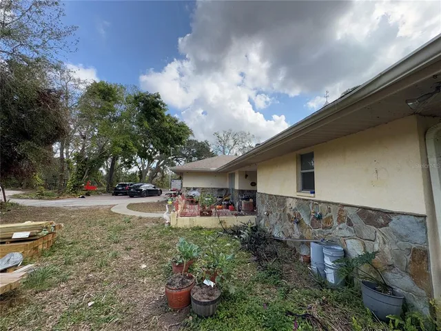 a bed room with a bed and a window