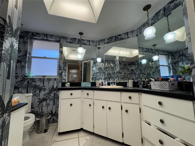a bathroom with a sink and a shower