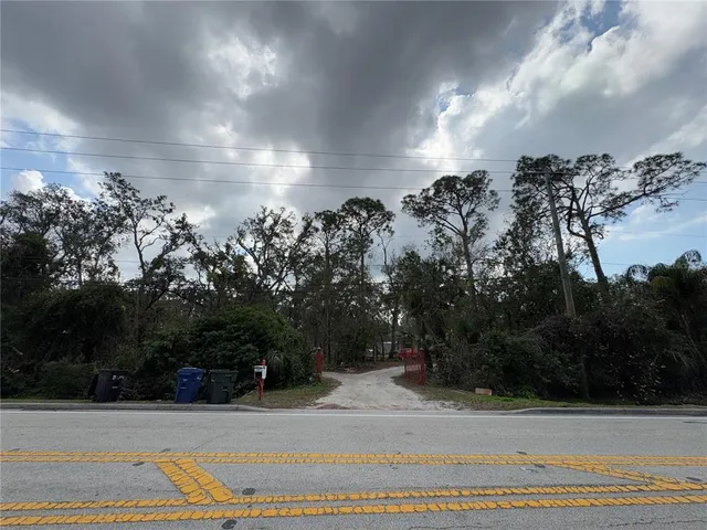 a view of a outdoor space with a lake view