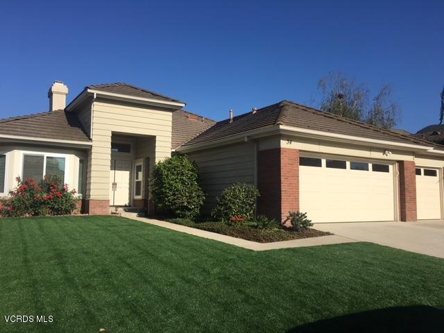 34 South Madrid Avenue Newbury Park, CA 91320 - Photo 1 of 31 a front view of a house with a yard