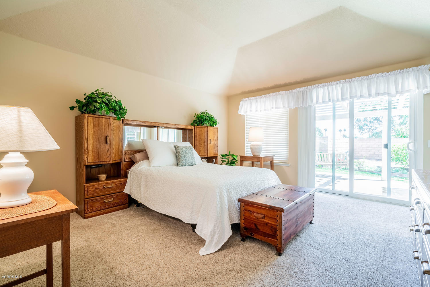 34 South Madrid Avenue Newbury Park, CA 91320 - Photo 17 of 31 a spacious bedroom with a bed and a couch