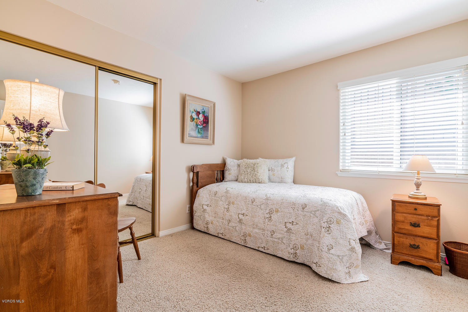 34 South Madrid Avenue Newbury Park, CA 91320 - Photo 22 of 31 a bedroom with a bed and a dresser