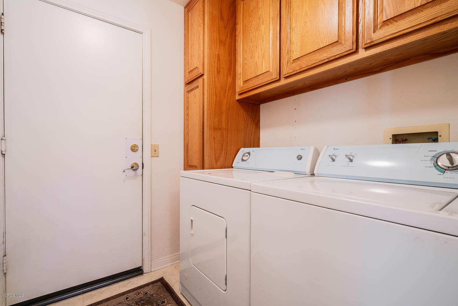 34 South Madrid Avenue Newbury Park, CA 91320 - Photo 25 of 31 a utility room with dryer and washer