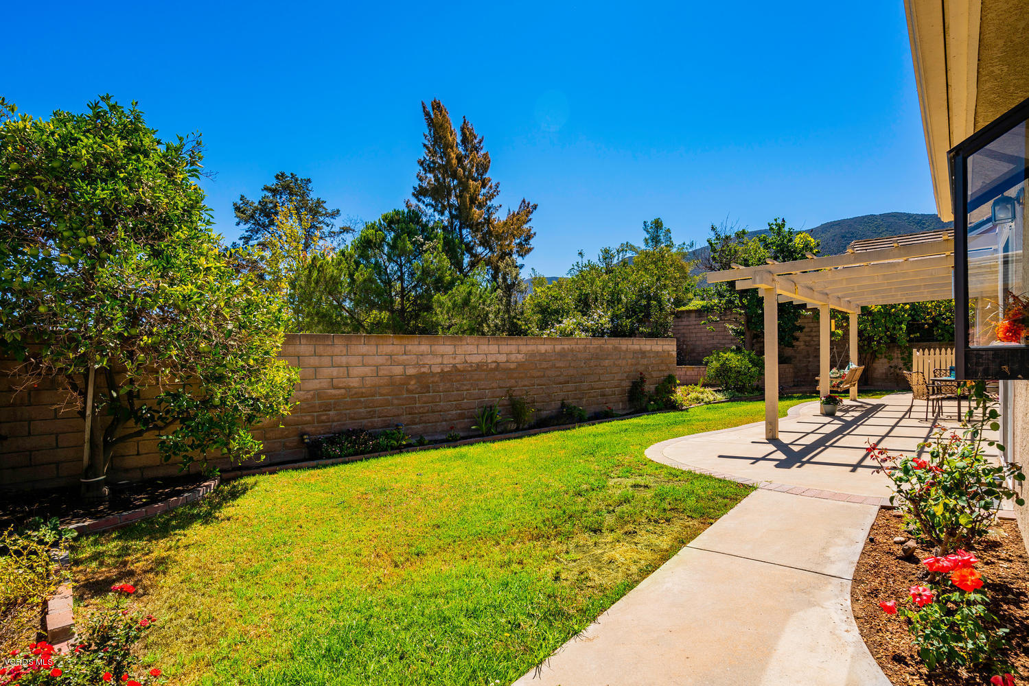 34 South Madrid Avenue Newbury Park, CA 91320 - Photo 26 of 31 a view of yard with swimming pool and green space
