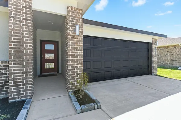 a view of outdoor space garage and window